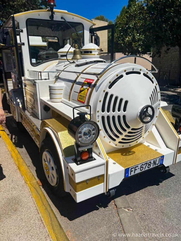Gold and white shuttle train to Cassis, south of france.