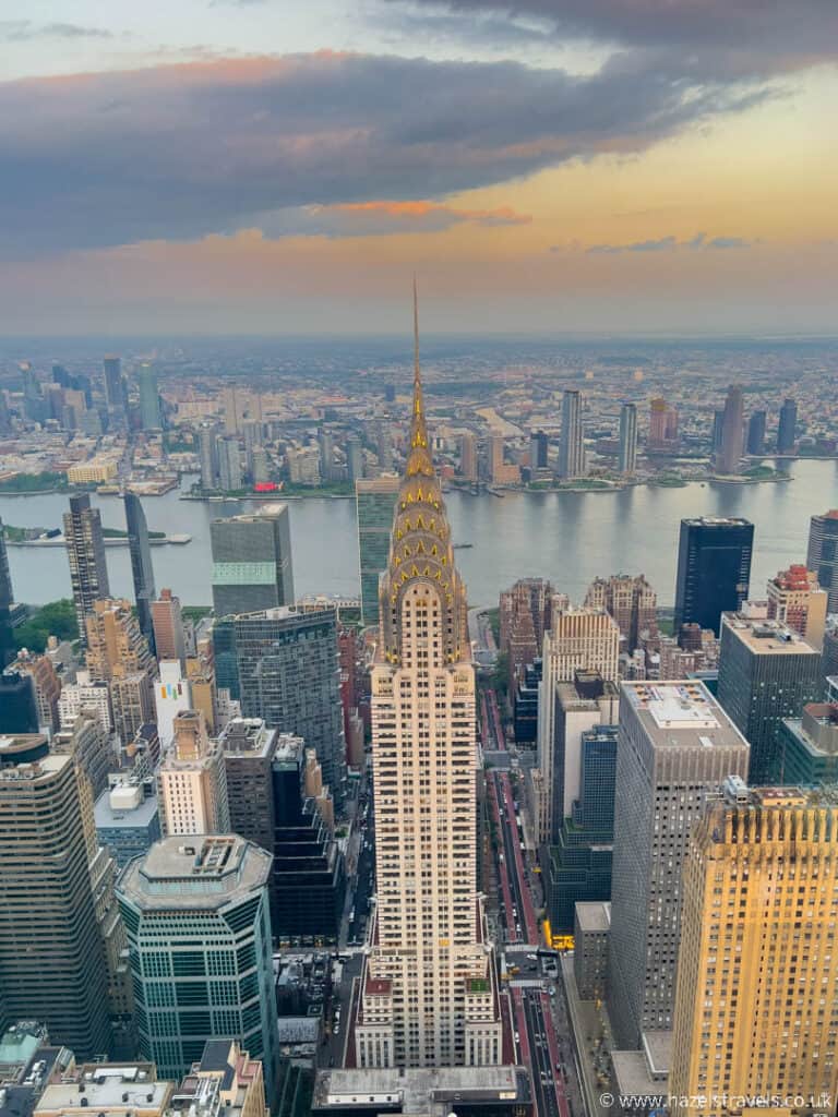 View of the Chrysler building from Summit One Vanderbilt observation deck in NYC at sunset.