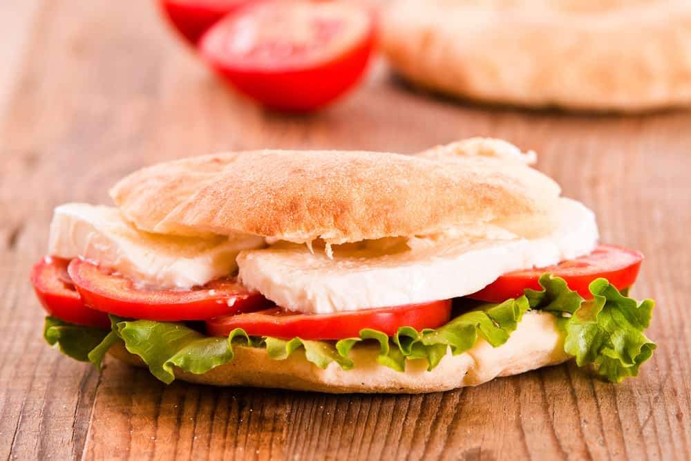 a close up of a sandwich on a table.