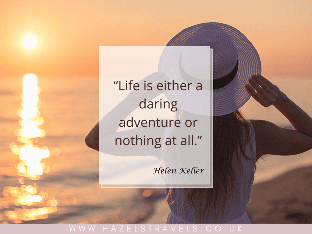 A woman in a white hat looks at a sunset over the ocean. The overlay text reads, “Life is either a daring adventure or nothing at all.” — Helen Keller. Website URL at the bottom.