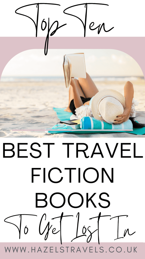 Beach vacation reading on the sand with a sun hat and open book, perfect for relaxing by the sea.