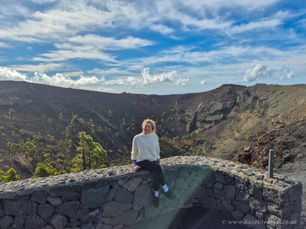 Bryce Canyon National Park with a young woman sitting on a stone viewpoint, showcasing stunning landscapes, hiking adventure, and scenic views in the USA.