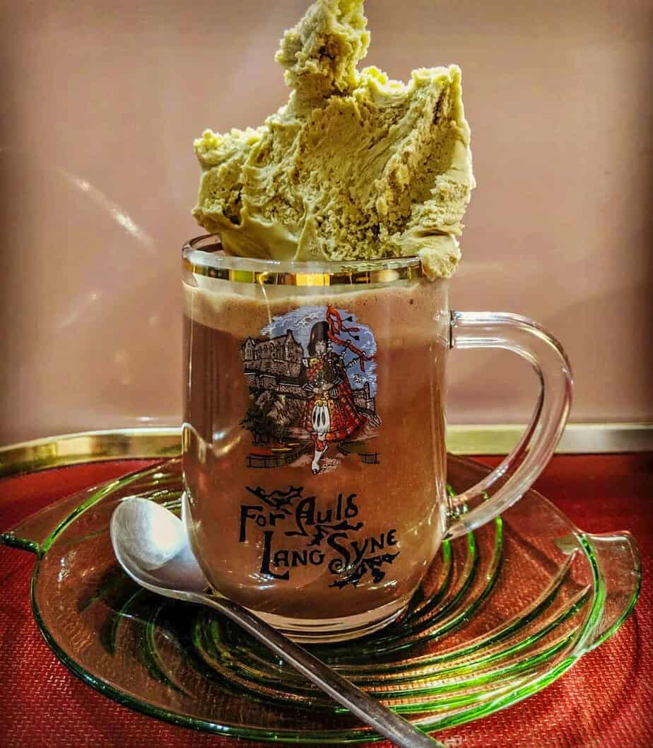 Mary’s Milk Bar hot chocolate, Edinburgh - Mug of hot chocolate topped with a swirl of pistachio gelato from Mary’s Milk Bar.