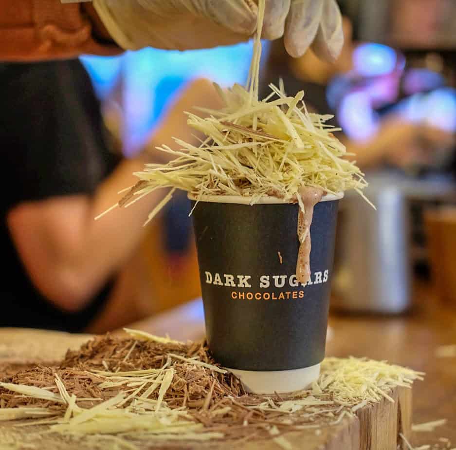Dark Sugars hot chocolate, London — Cup of rich hot chocolate topped with chocolate shavings from Dark Sugars on Brick Lane.