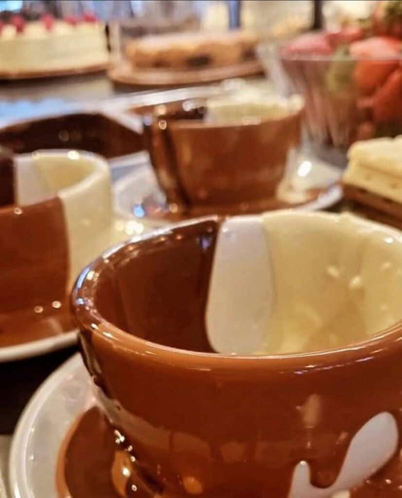 The Crazy Bear hot chocolate, London - Rich drinking chocolate in a chocolate covered mug served at The Crazy Bear lounge.