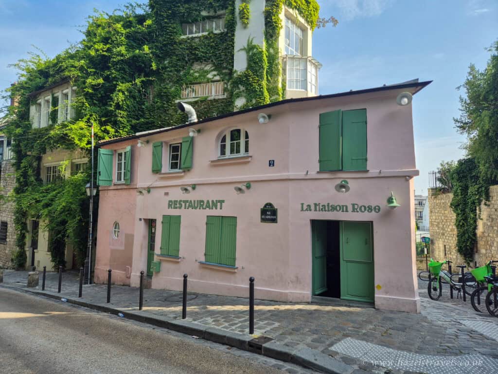 Rue de l’Abreuvoir, Montmartre - Scenic cobbled street lined with ivy-clad buildings, including La Maison Rose.