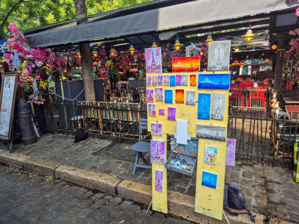 Le Refuge des Fondus, Montmartre - Colourful fondue restaurant with handwritten menus outside.