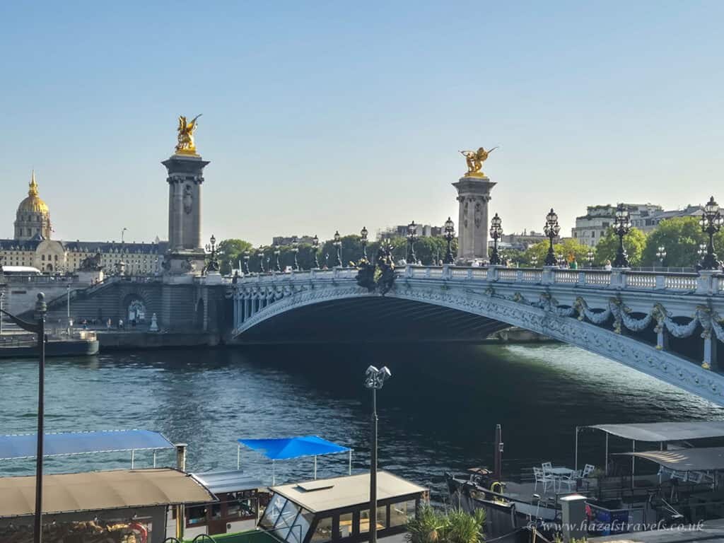 Pont Alexandre III, Paris — Ornate bridge with golden statues spanning the River Seine.
