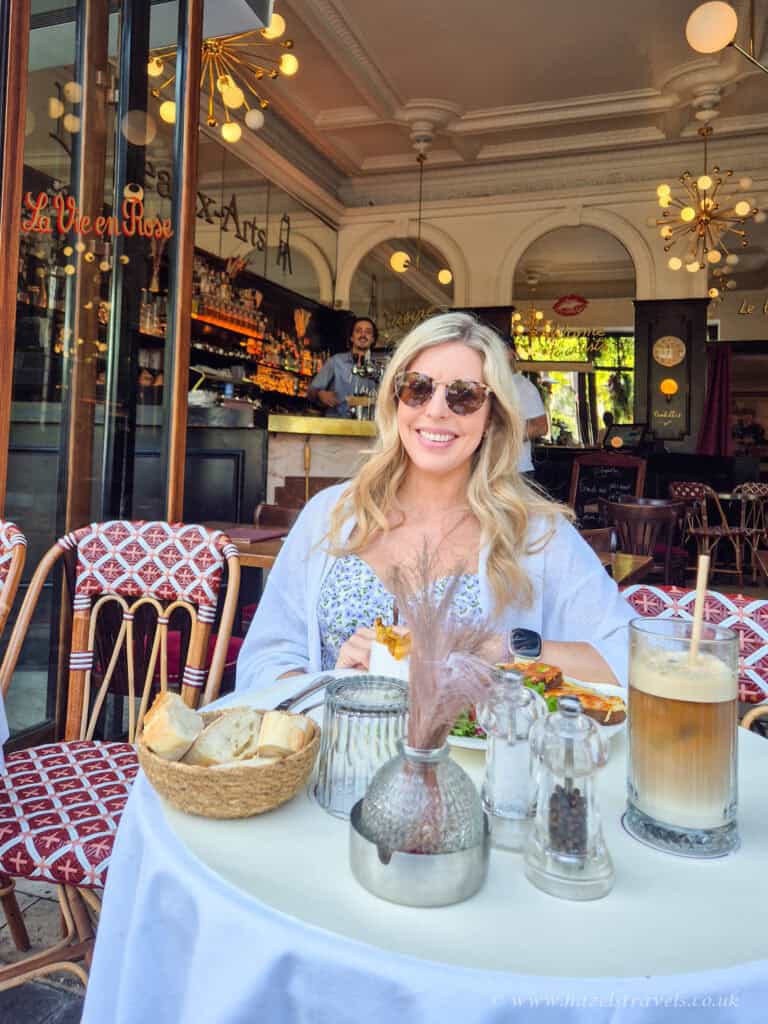 Lunch at Café de Flore, Paris — Woman enjoying croque monsieur and coffee at a classic Paris café table.