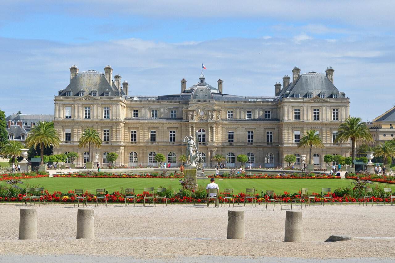 Luxembourg Gardens, Paris - Elegant view of the Luxembourg Palace with manicured lawns, fountains, and flowerbeds in front.