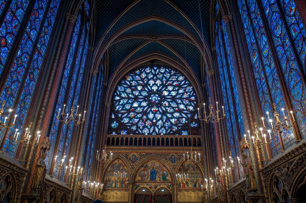 Sainte-Chapelle, Paris - Interior view of Sainte-Chapelle with its stunning stained-glass windows and ornate vaulted ceiling.