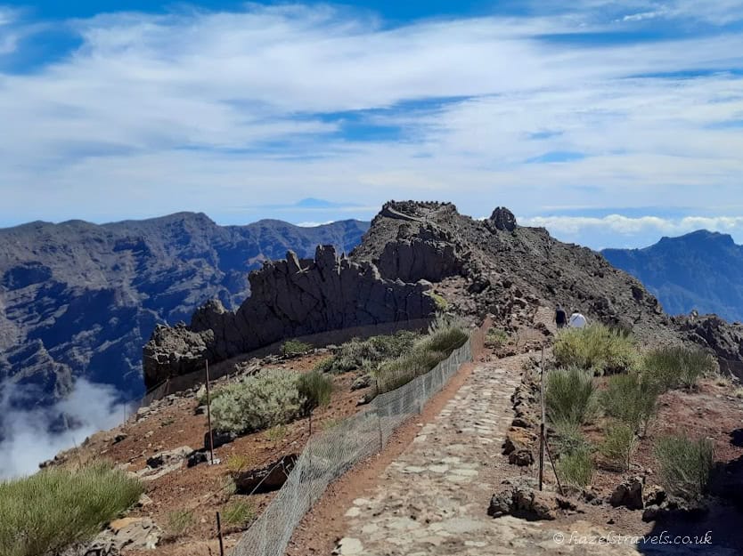 Stone path winding through volcanic terrain near Roque de los Muchachos
