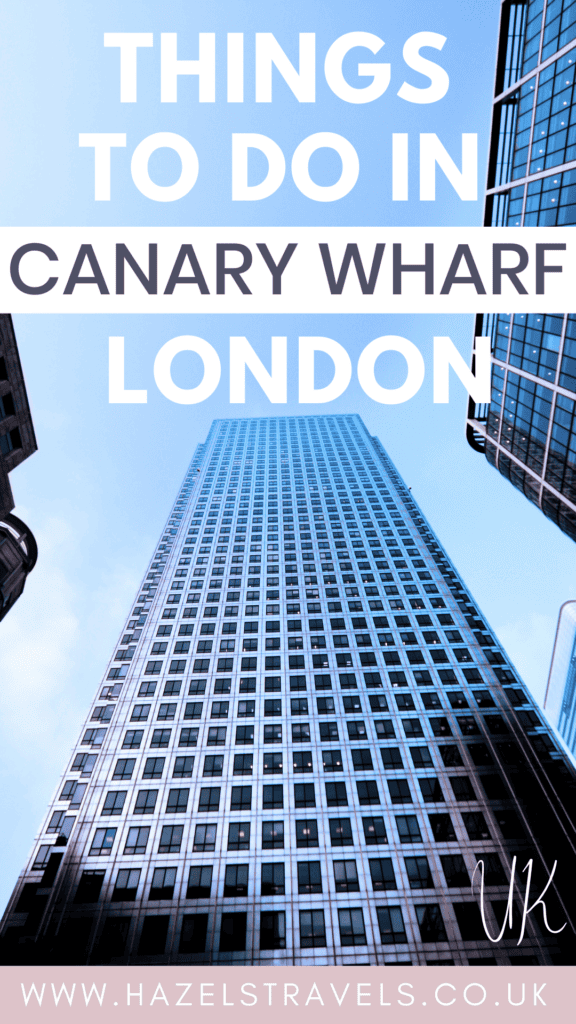 Pinterest graphic with white and pastel pink text reading “Things to Do in Canary Wharf, London” over a photo of the silver-blue glass skyscraper One Canada Square, framed by dark building edges and a pale blue sky, with a blush pink footer showing hazelstravels.co.uk.