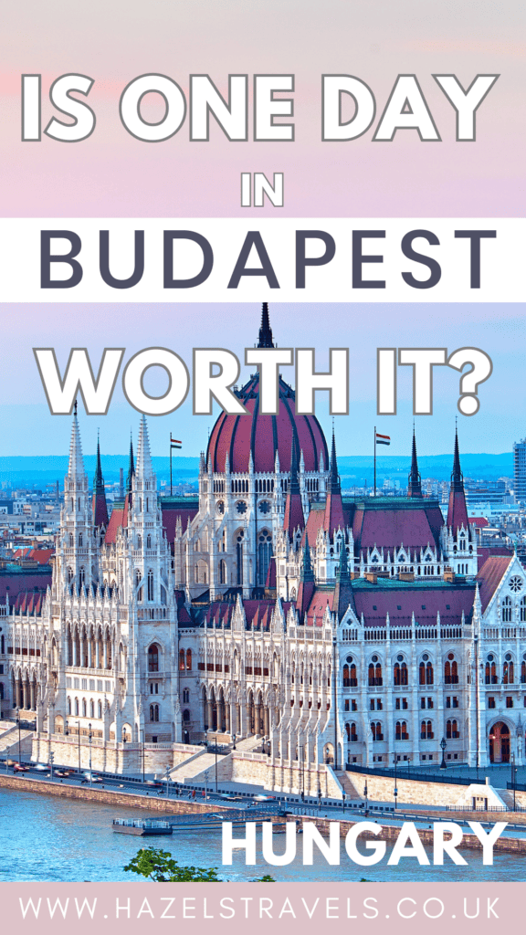 Daytime view of Budapest’s Parliament building beside the River Danube, with its red dome and spires standing out against a blue sky. Large text over the image reads “Is one day in Budapest worth it?” with “Hungary” and “www.hazelstravels.co.uk” at the bottom.