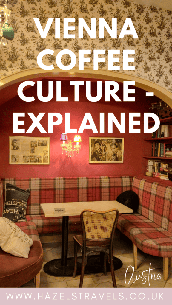 Graphic reading “Vienna Coffee Culture – Explained” over a cosy café interior with red walls, patterned wallpaper, a corner banquette, and framed artwork, with hazelstravels.co.uk at the bottom.