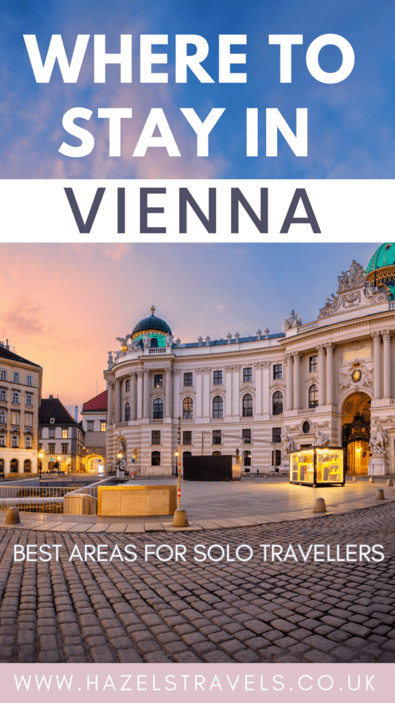 Pinterest pin for Where to Stay in Vienna featuring the illuminated Hofburg Palace at dusk with a pink and blue sky above a cobbled plaza