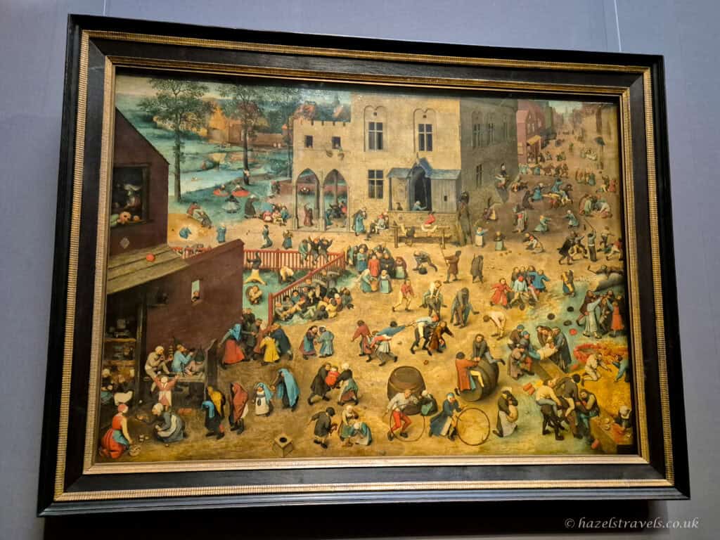 The painting “Children’s Games” by Pieter Bruegel the Elder, depicting a crowded village scene filled with children playing dozens of different games.