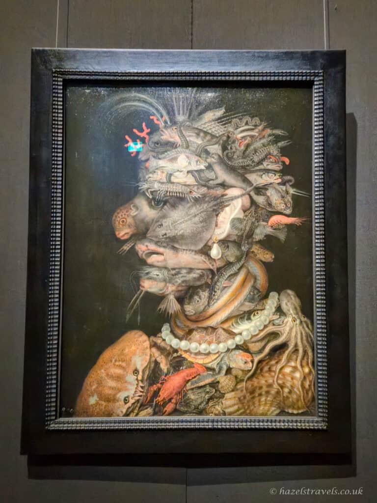 Arcimboldo’s painting “Water”, depicting a human face in profile constructed entirely from fish, shells, and marine animals.
