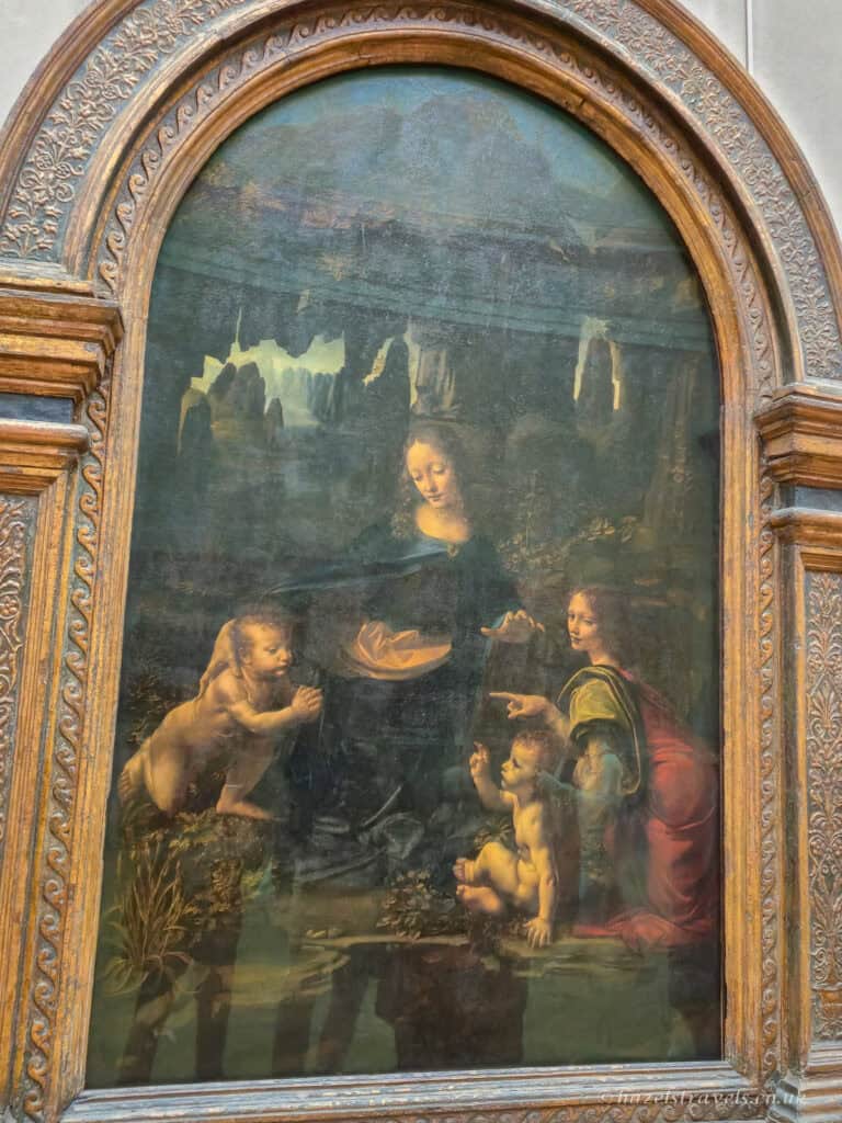 The Virgin of the Rocks by Leonardo da Vinci – one of the standout Louvre highlights from the Italian Renaissance section.